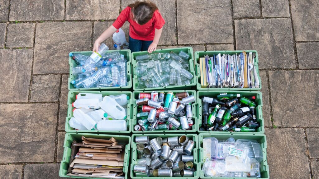 girl resorting recyclable objects
